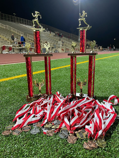 Track Team Leaps Past Competition