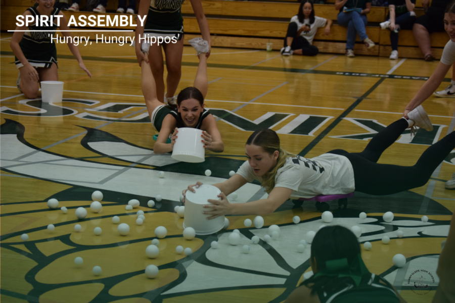Senior Sophie Ugarte plays Hungry Hungry Hippos at the Spirit Assembly..
